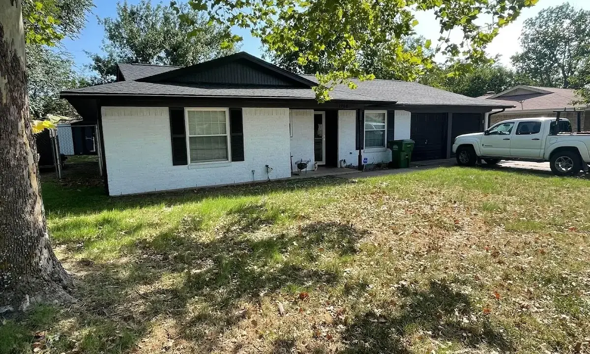 Professional roofing crew working on a residential roof in Jacksonville